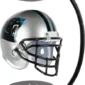 A floating football helmet with a panther logo, held by a magnetic stand.